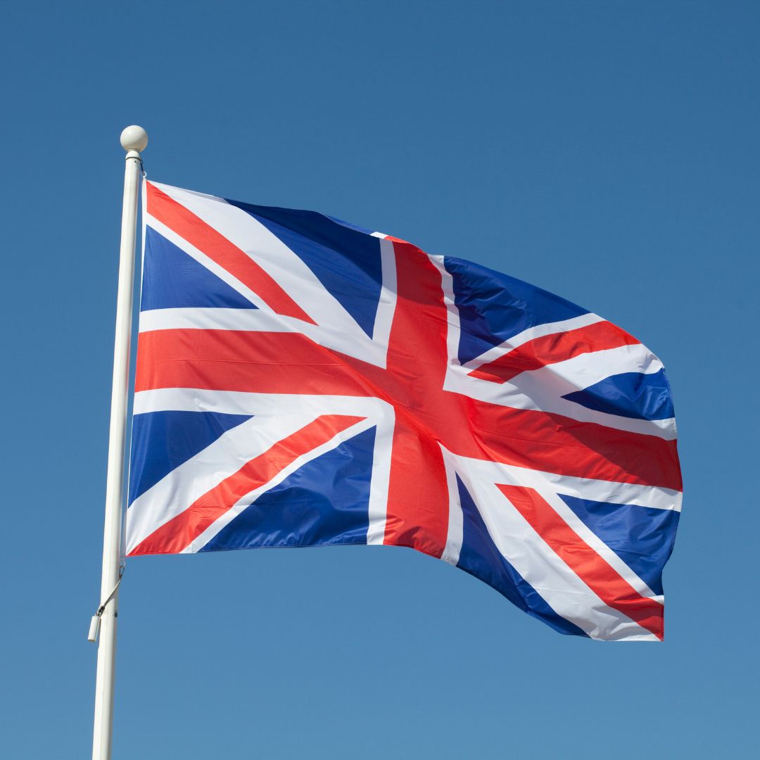 A UK flag waving in the wind