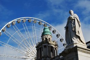 An image of iconic Belfast landmarks, including the Belfast Wheel.