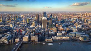 An image of London city skyline, including The Shard and Sky Garden.