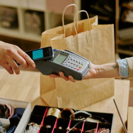 A customer making a test purchase with a contactless card