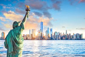 An image of New York, including the skyline and Statue of Liberty.