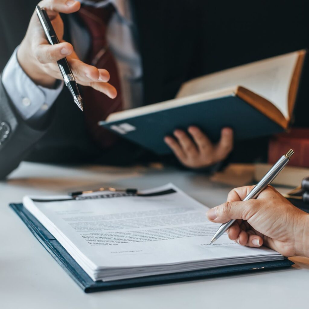 A lawyer and a client discussing an IP opposition