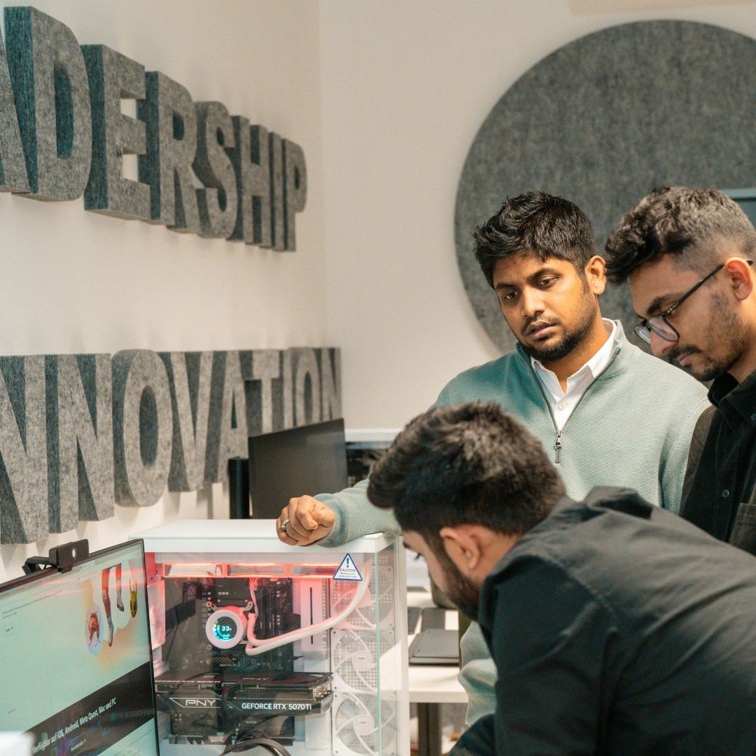 A group of innovators reviewing technology that has been built